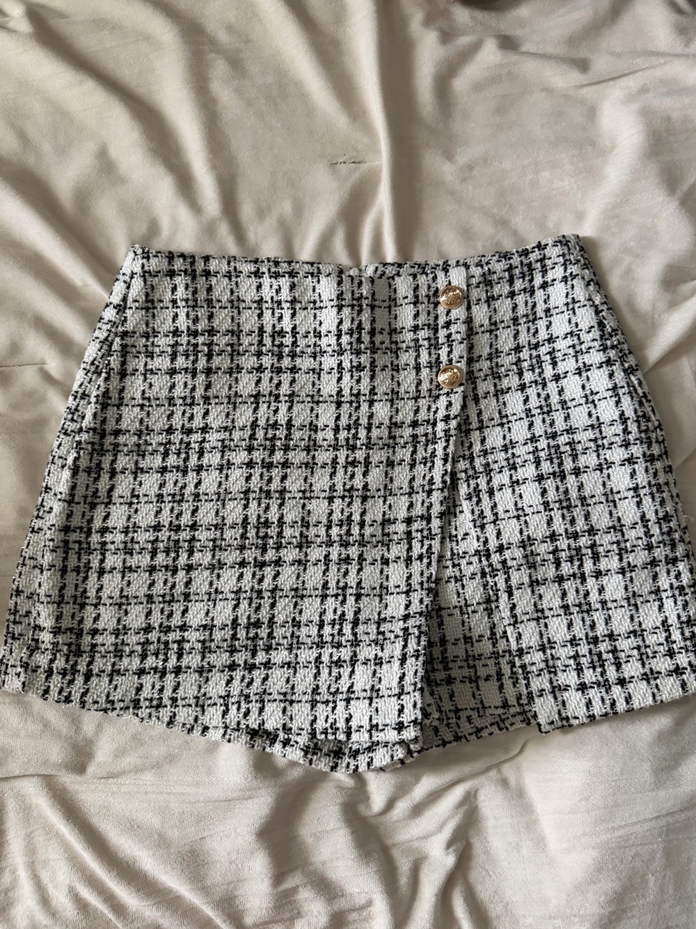 Black and White Tweed Mini Skort with Gold Buttons zipper in back.